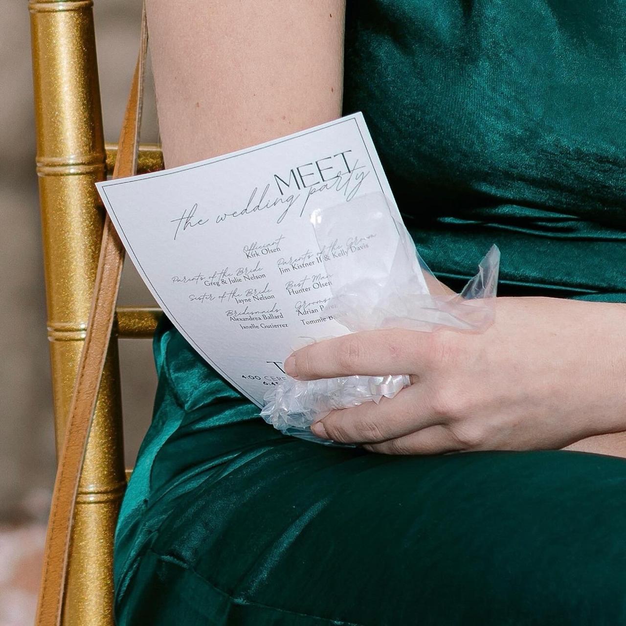Ceremony program card on a paper background